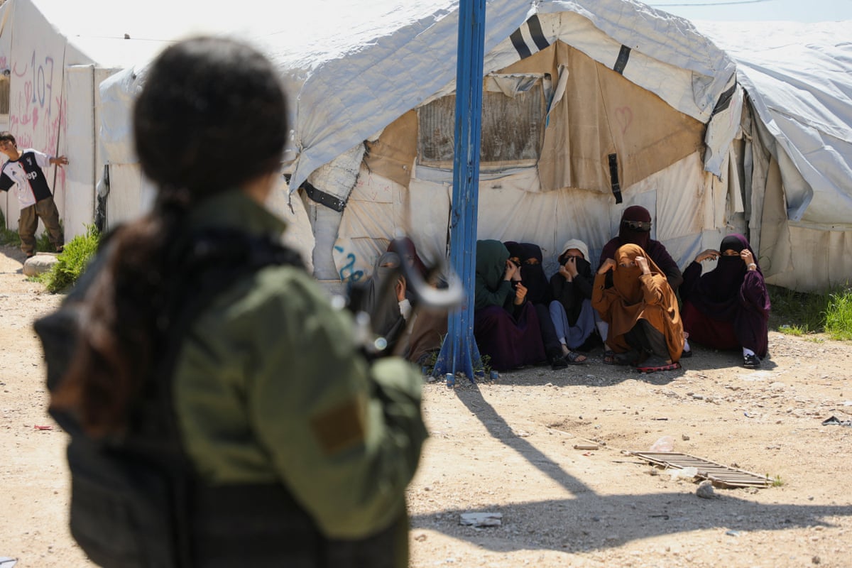 Australian families wait to leave Roj camp near in Syria on 24 April.
