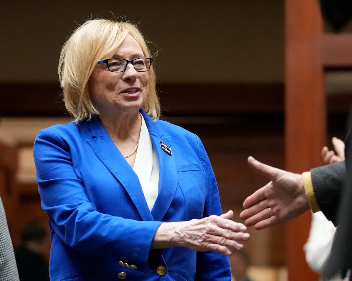 Maine’s governor, Janet Mills, greets lawmakers prior to delivering her state of the state address on 30 January 2024, at the state house in Augusta, Maine.