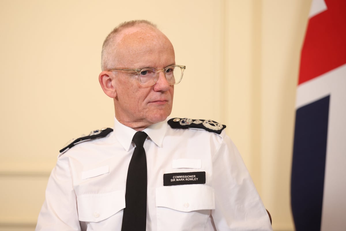 Metropolitan police commissioner Mark Rowley sat at a meeting in Downing Street.