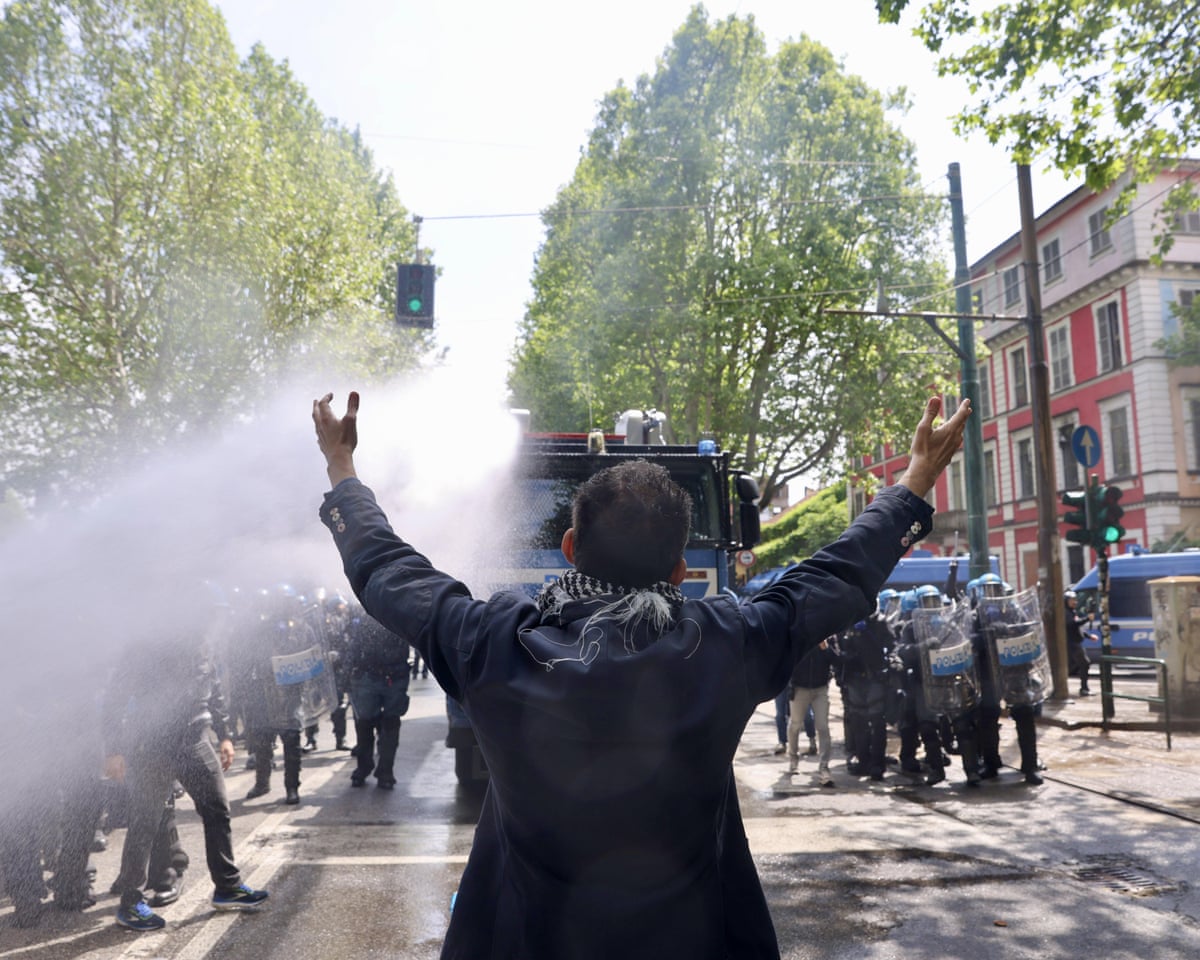Clashes between protesters and police at the May Day march in Turin, Italy.