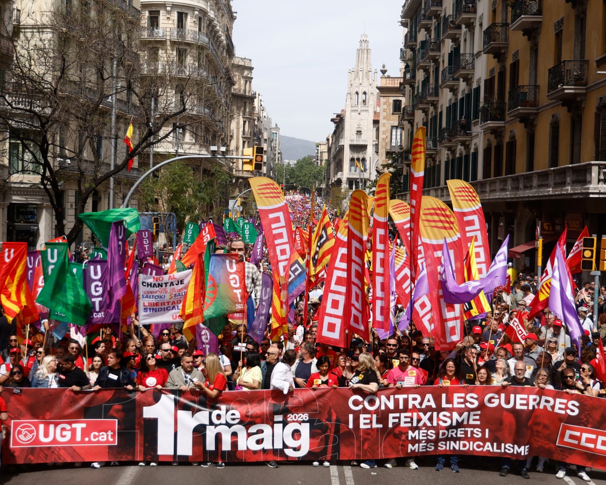 Demonstrators attend a rally to mark the International Workers' Day in Barcelona, Spain.