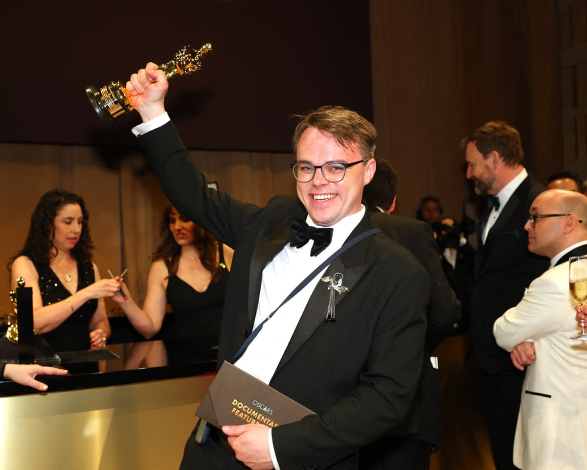 Russian teacher Pavel Talankin raises his Oscar for Best Documentary Feature Film for “Mr. Nobody Against Putin” at the 98th Annual Academy Awards Governors Ball at the Dolby Theatre in Hollywood, California.