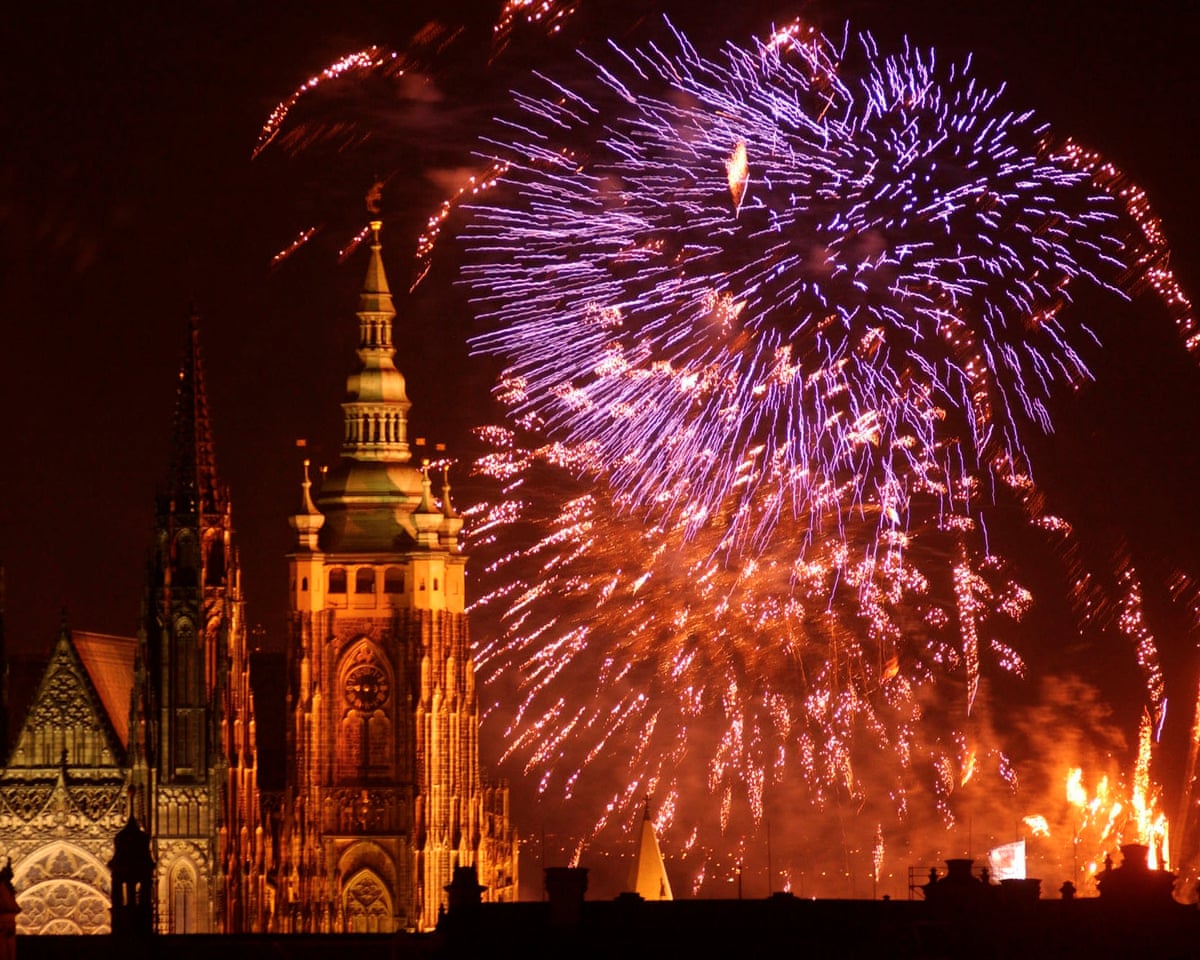 Fireworks explode over St. Vitus cathedral at Prague Castle to mark the European Union's enlargement at midnight in May 2004.