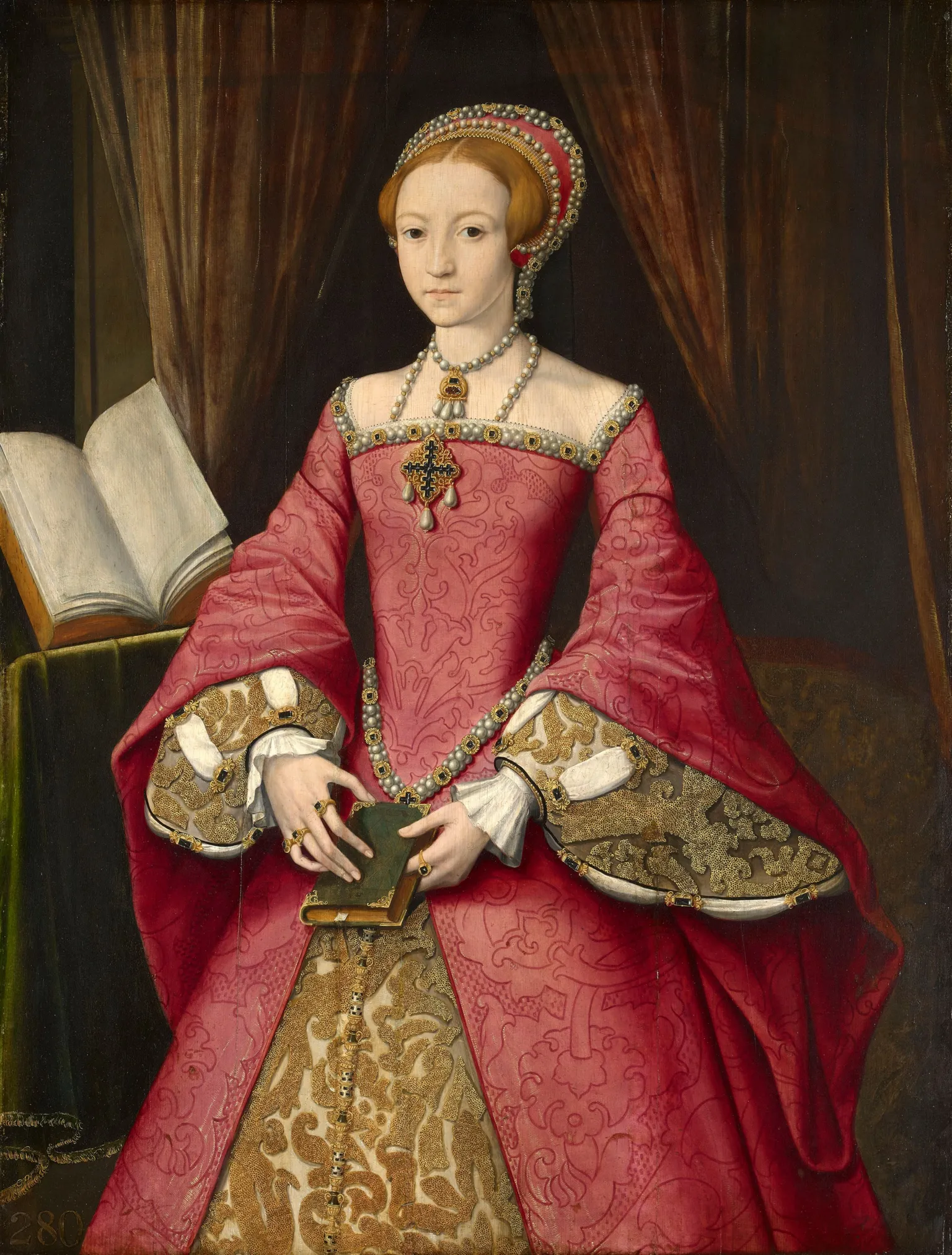 Royal Collection Enterprises Limited 2026 | Royal Collection Trust A painting of young Elizabeth I in a red and gold dress. She is holding a book and there is a larger, open book on the left-hand side. 