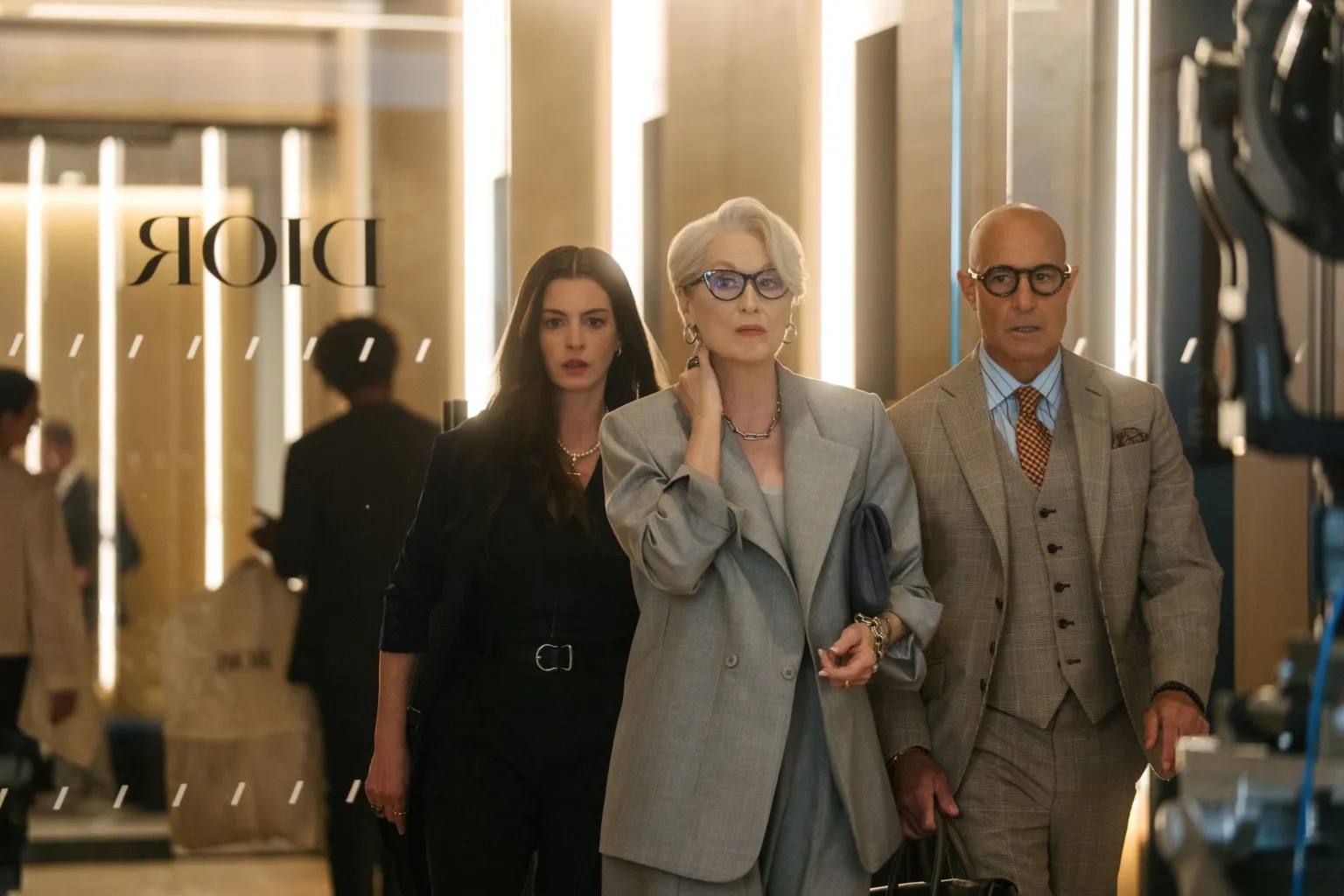 Walt Disney Studios Still from The Devil Wears Prada 2 of Anne Hathaway, Meryl Streep and Stanley Tucci