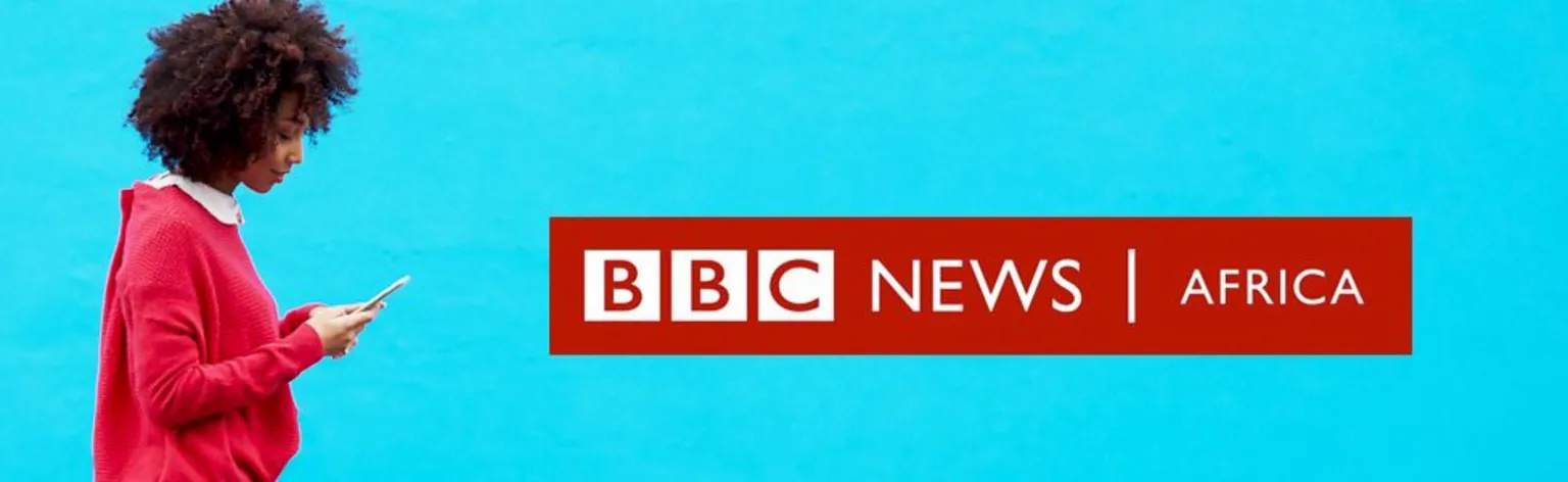 /BBC A woman looking at her mobile phone and the graphic Africa