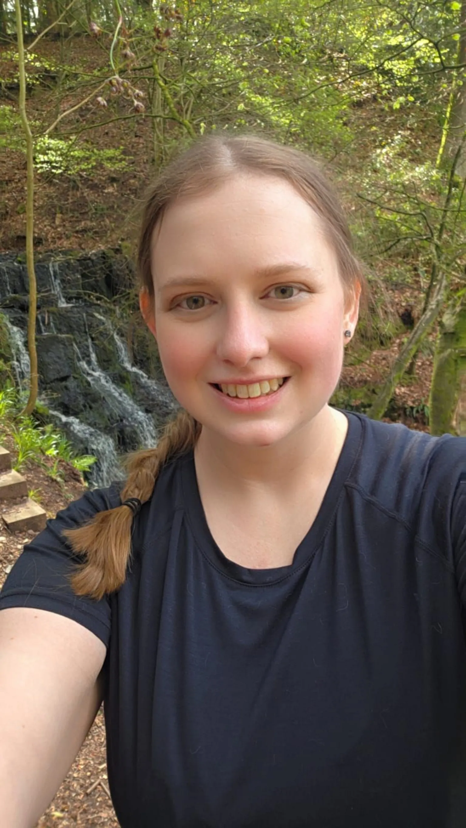 Hannah Long Hannah Long takes a selfie smiling at the camera. She has light brown hair which is plaited and sits on her left hand shoulder and smiles 