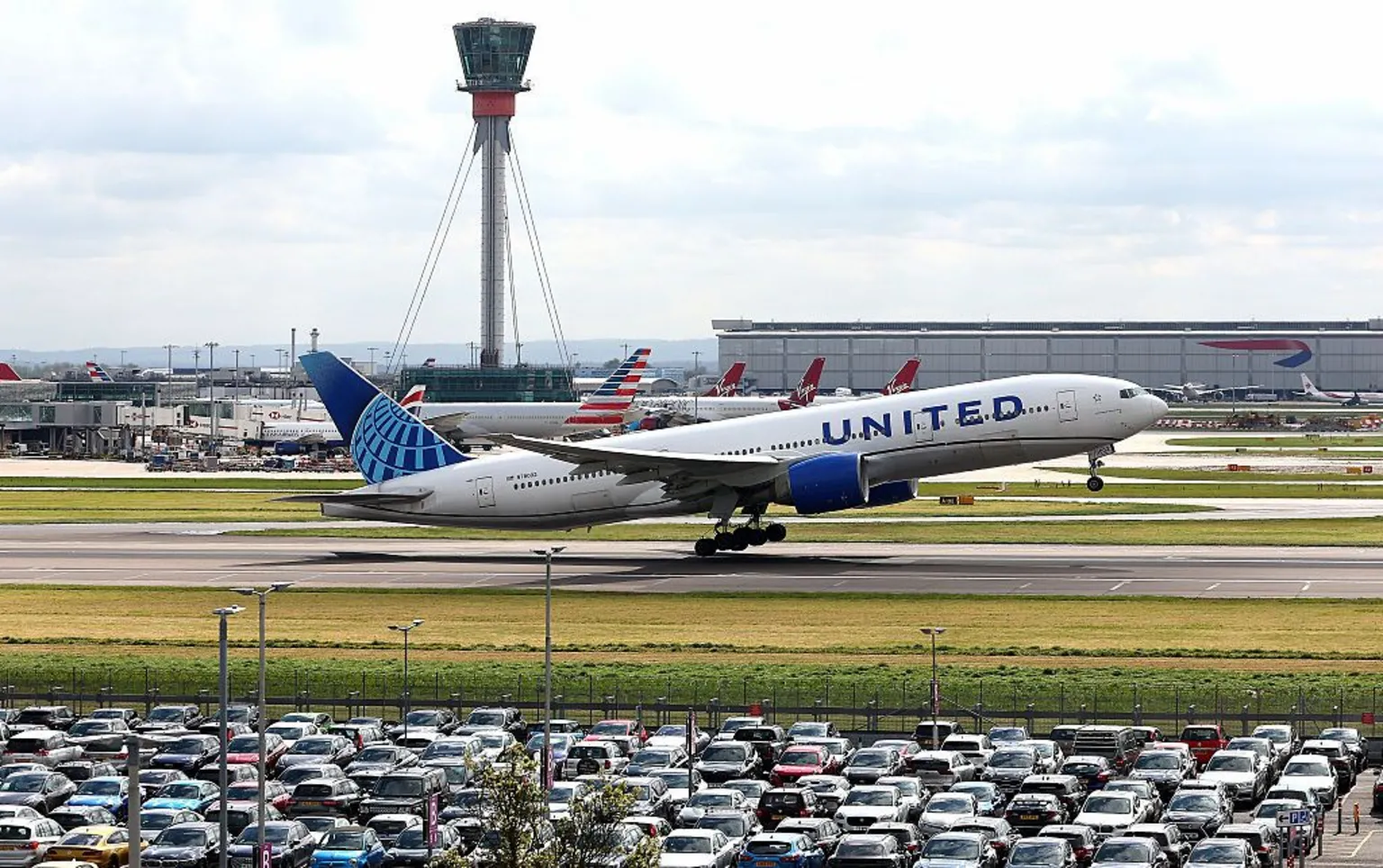  A plane takes off at London Heathrow airport.