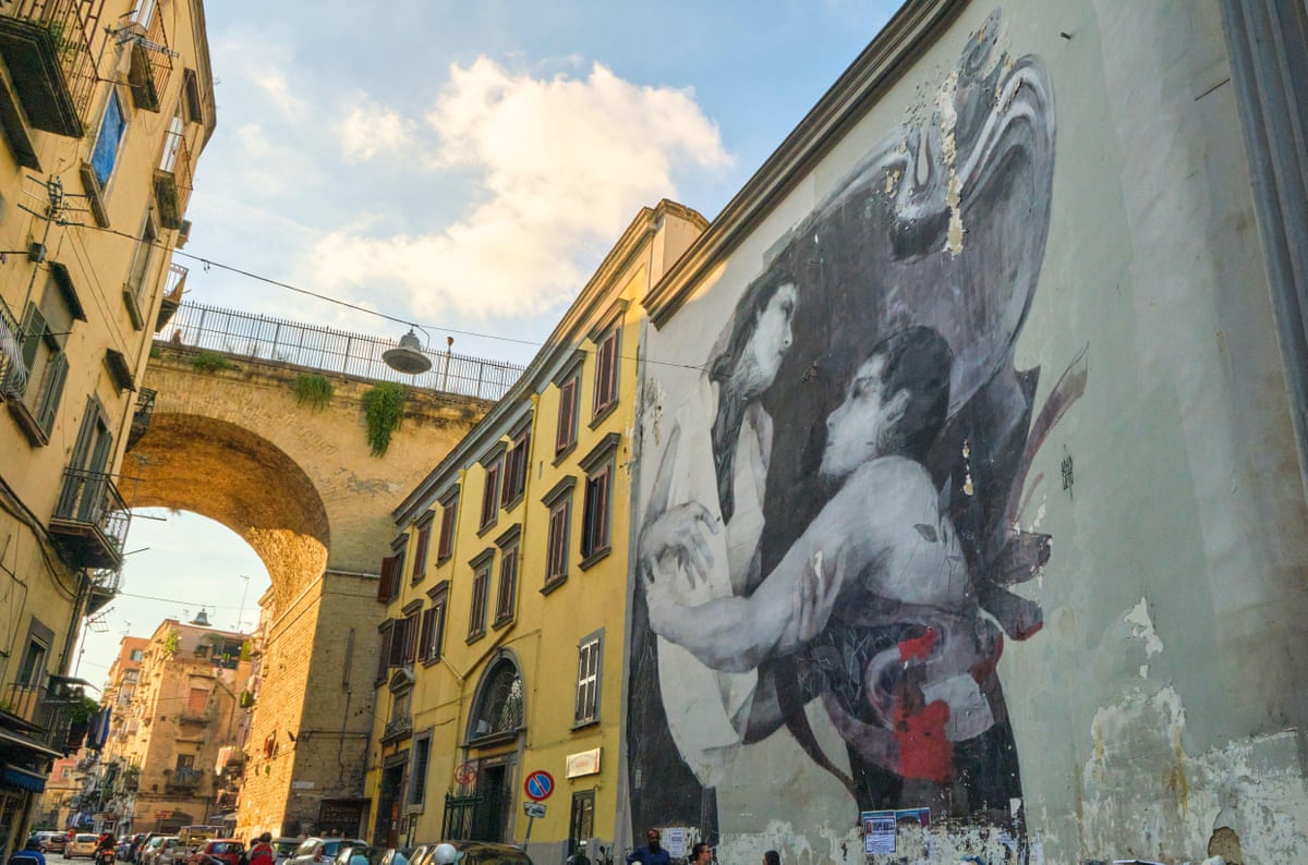 Mural on the side of a church in Naples.