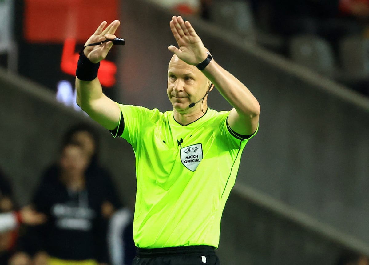 Anthony Taylor leads today’s team of match officials at Stamford Bridge.