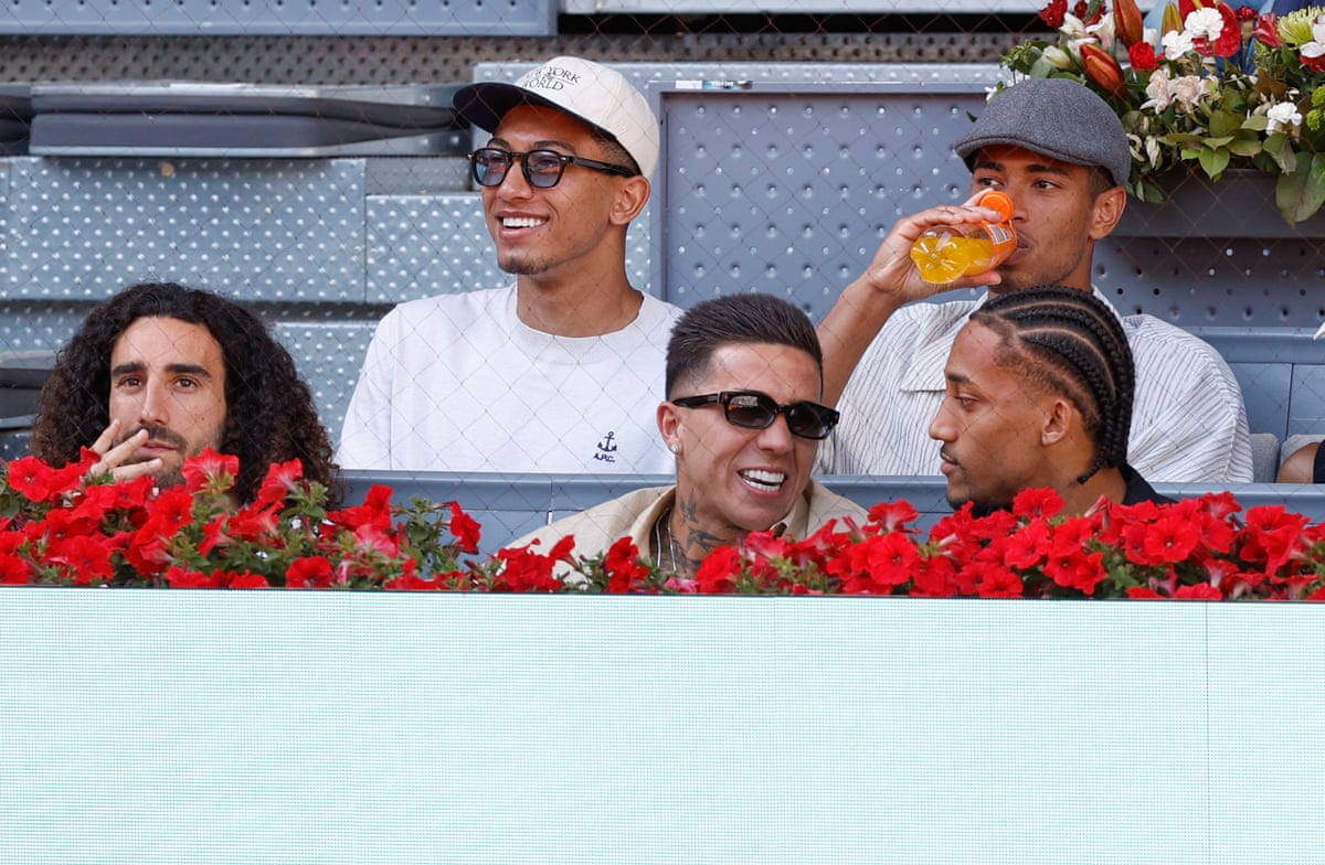 What, no Cliff Richard? (L-R) Marc Cucurella, Jobe Bellingham, Enzo Fernandez, Jude Bellingham, and Joao Pedro watch the Madrid Open.