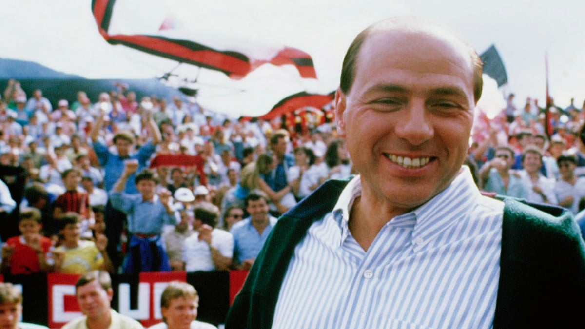 Silvio berlusconi young, smiling at a rally