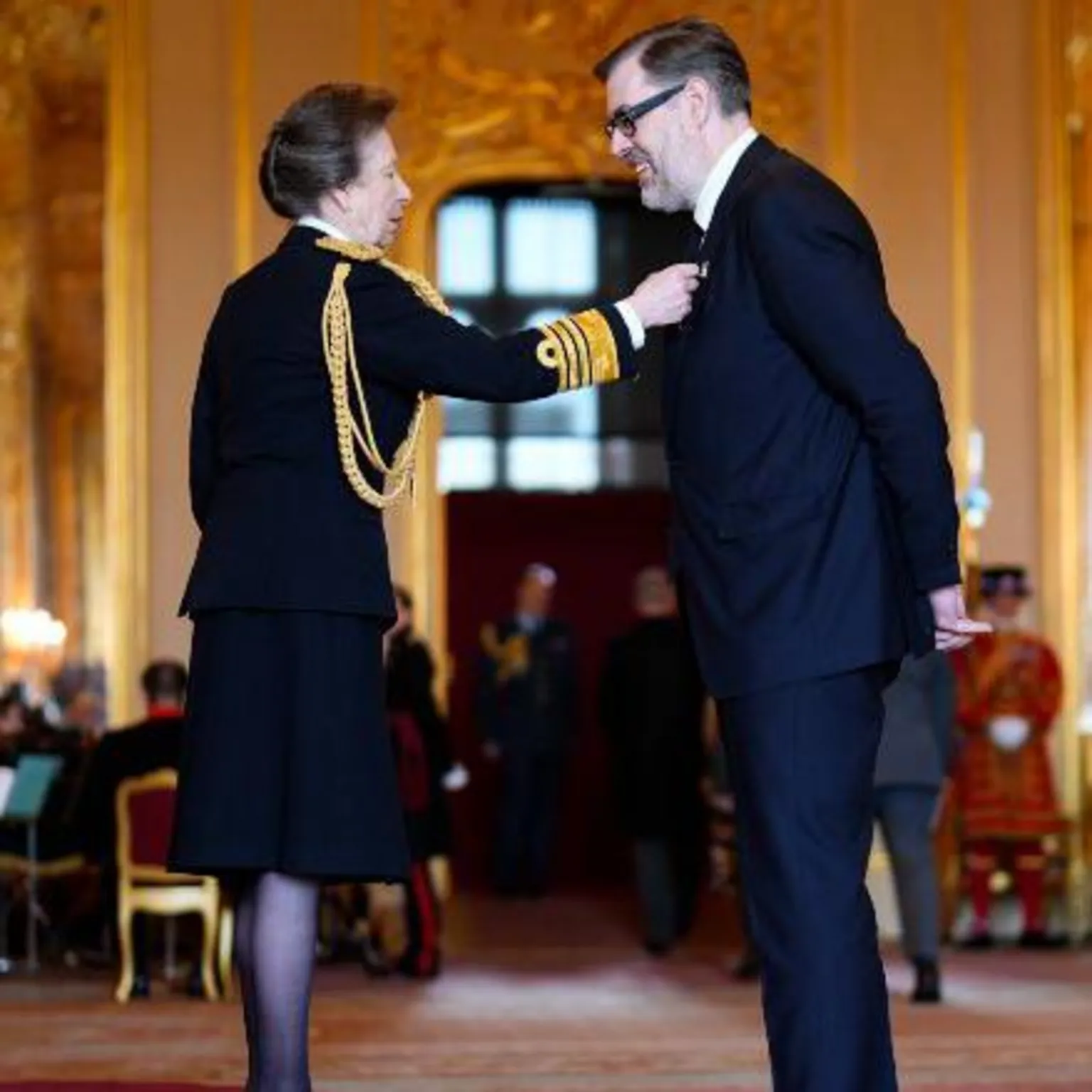  Richard Osman being made an Officer of the Order of the British Empire (OBE) by the Princess Royal at Windsor Castle, Berkshire.