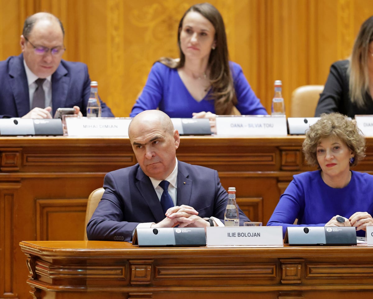 Romania’s prime minister Ilie Bolojan prepares to deliver his speech before a no-confidence vote on his cabinet during a plenary session of the parliament in Bucharest, Romania.