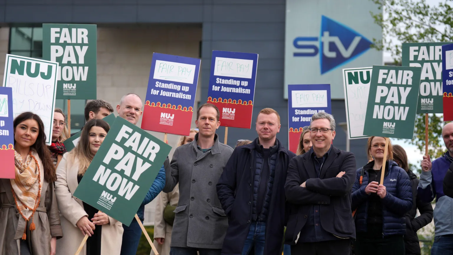  A group of STV reporters and staff on strike outside the broadcaster's office in Glasgow.