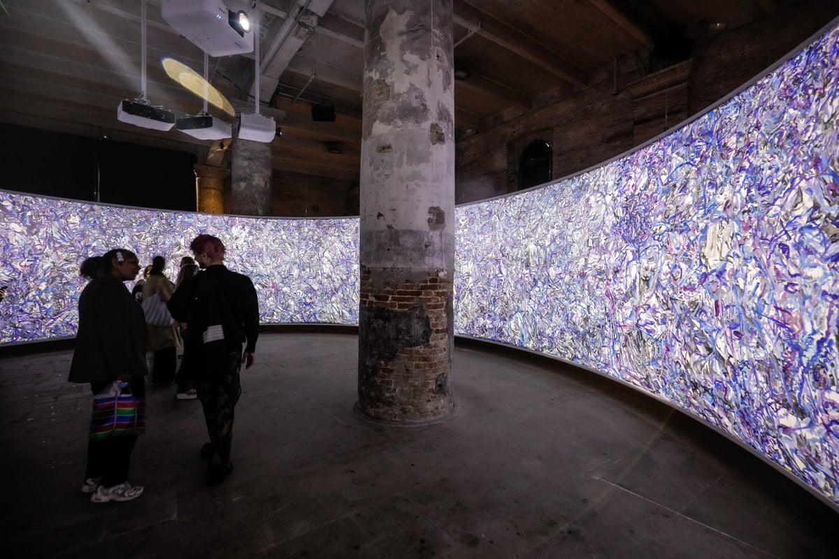 People at the Venice Biennale observe Sabsabi’s work in the Arsenale