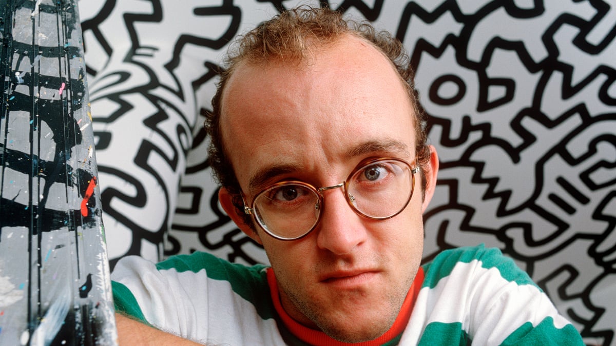 Keith Haring poses for a portrait 