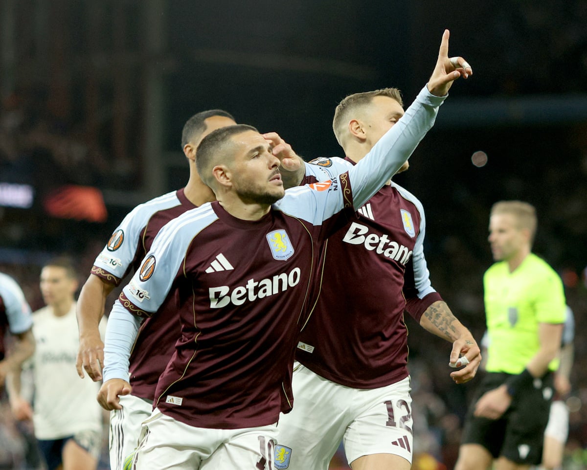 Emiliano Buendía raises his finger in celebration after scoring his penalty during the Europa League semi-final match between Aston Villa and Nottingham Forest