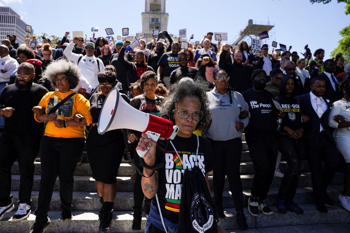 Demonstrators walk down stairs outside the Tennessee state Capitol following passage of the new congressional map on 7 May 2026.