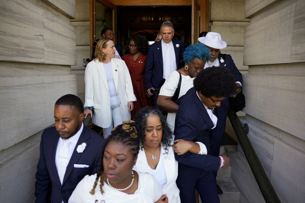 Democratic state House representatives and senators leave the Tennessee state Capitol following passage of the new congressional map by the Republican majority.