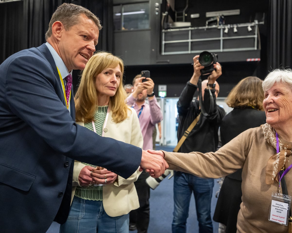 Rhun ap Iorwerth shakes the hand of a supporter in Llandudno 