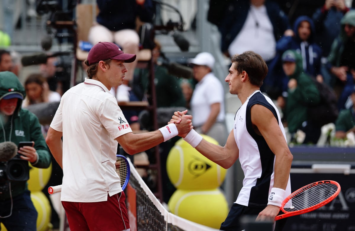 Alex de Minaur and Matteo Arnaldi shake hands after their second round match at the Italian Open