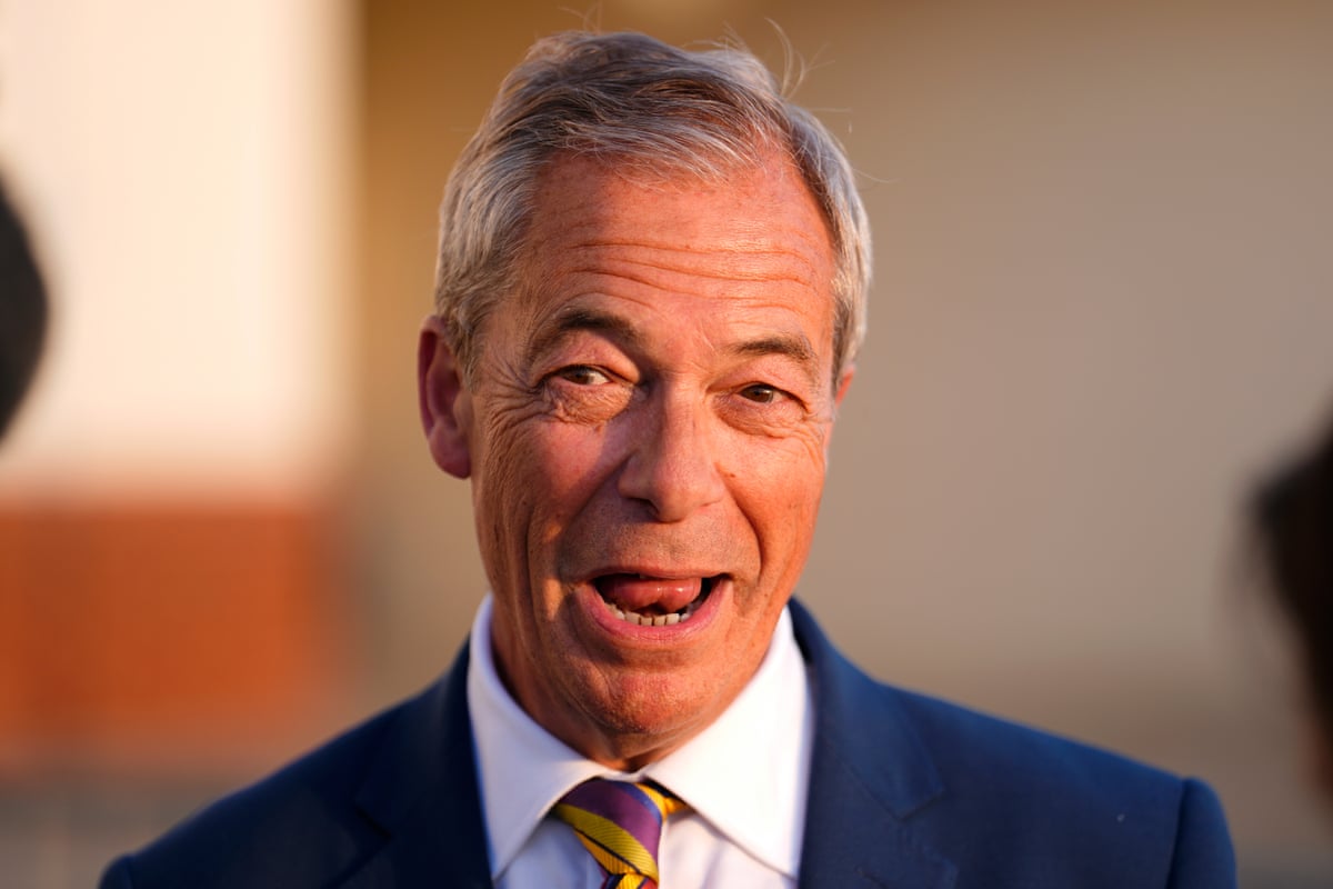 Reform UK leader Nigel Farage speaks to reporters as he arrives at a gathering for party supporters at Chelmsford City Racecourse, Essex.