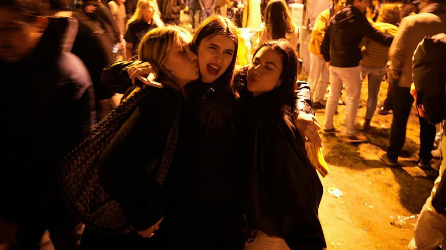 NurPhoto via Revellers are seen in the streets in Budapest, Hungary on 13 April, 2026
