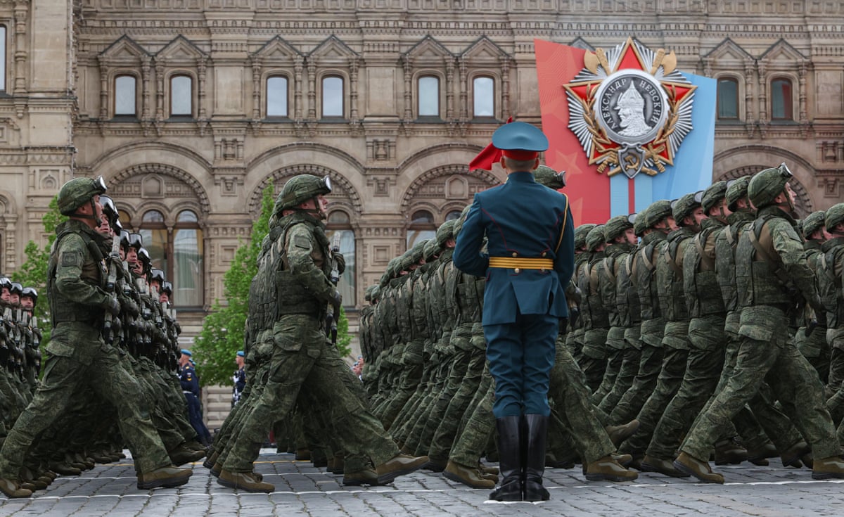 Russian military servicemen march in unison in Moscow’s Red Square. 