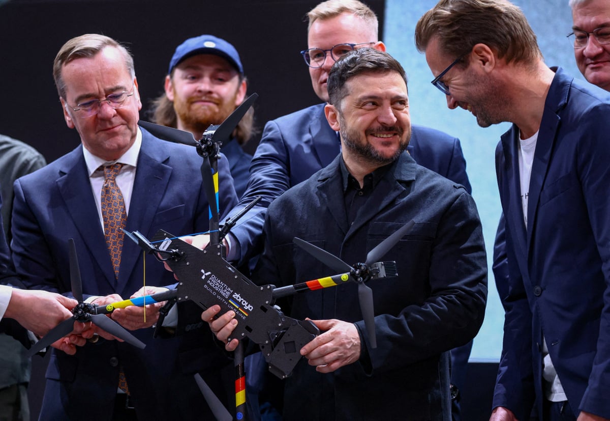 Volodymyr Zelenskyy holds a drone