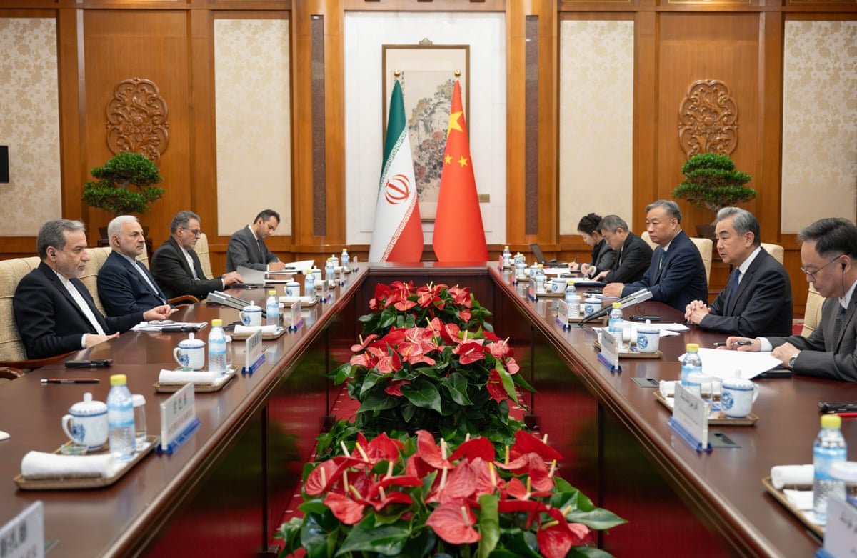 Chinese Foreign Minister Wang Yi, second right, talks to his Iranian Counterpart Abbas Araghchi, left, during the bilateral meeting in Beijing, earlier this week, on 6 May.