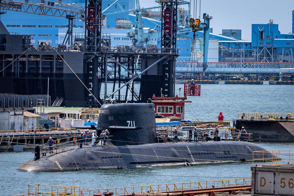 Following first torpedo test fire Taiwans indigenous submarine Haikun SS-711 returns to dry dock in Kaohsiung City, 8 May 2026