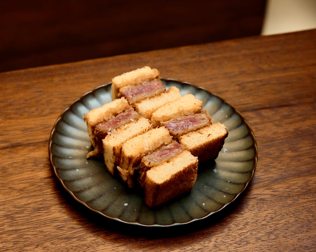 ‘A bit rustic’: Mitsu’s wagyu sandos cut into four chubby sections, crossways like a toddler’s post-Pigeon Street lunch.
