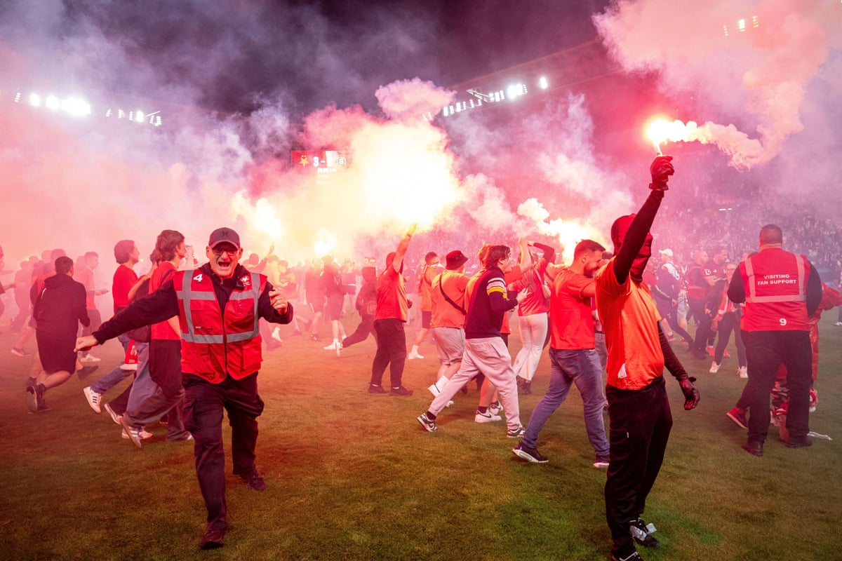 Fans of Slavia Prague invading the pitch few minutes before end