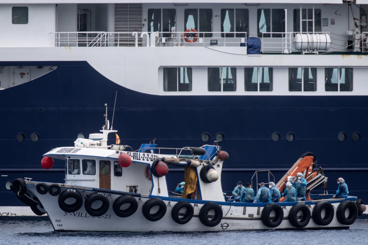 Passengers are evacuated by small boat from the MV Hondius in Tenerife.