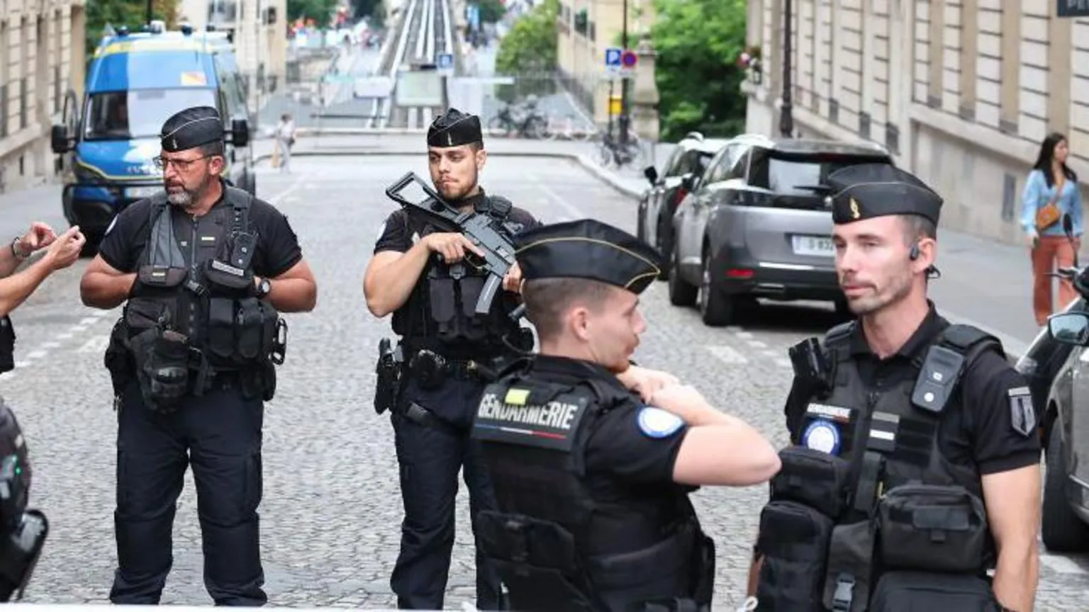 AFP via Armed, uniformed police on a street in Paris