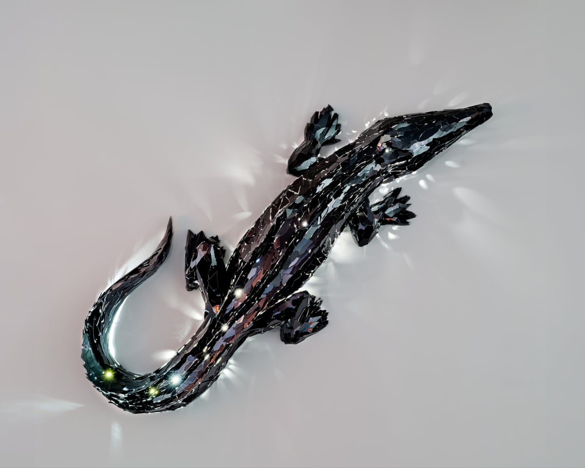 A black crocodile sculpture on a white background.
