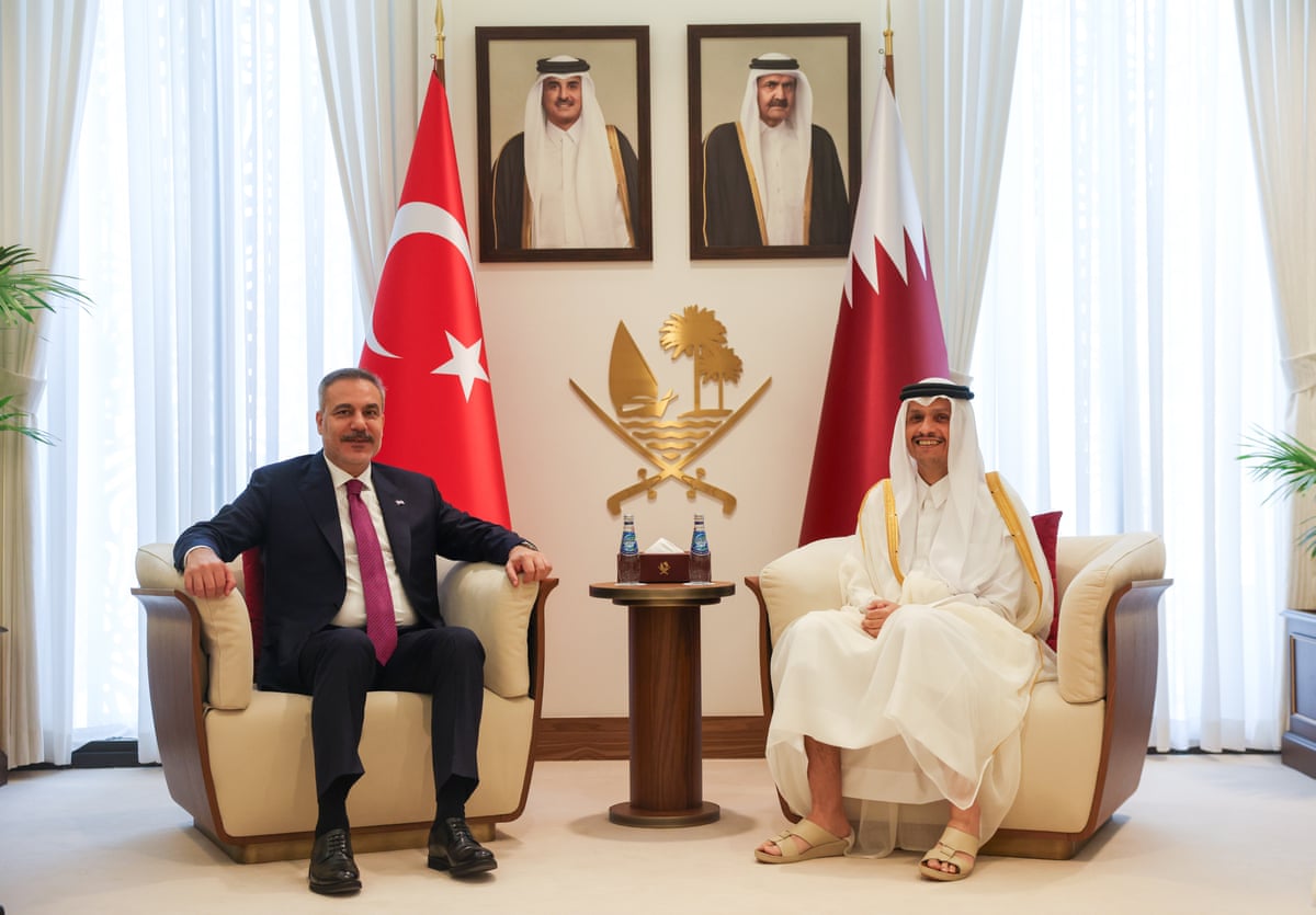 Turkish foreign minister Hakan Fidan (L) meets Qatari prime minister Sheikh Mohammed bin Abdulrahman Al Thani (R) in Doha, Qatar.