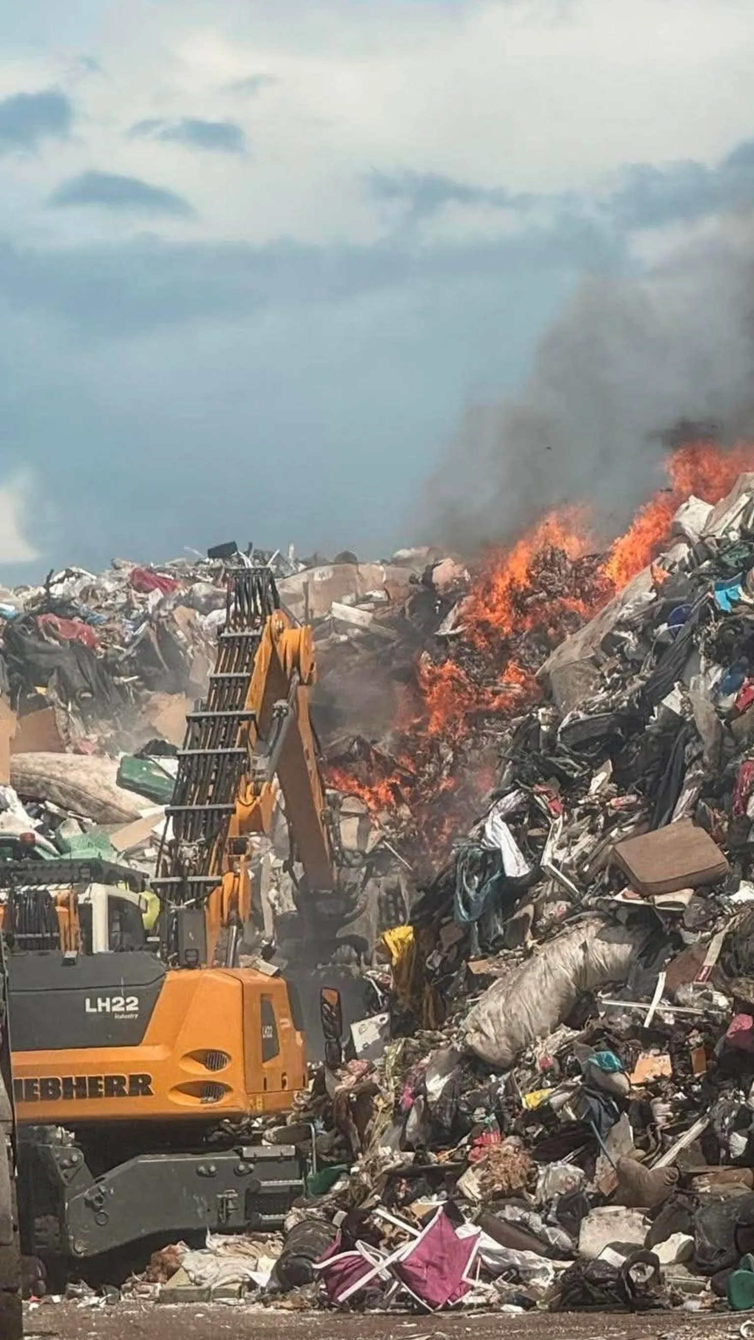 Fife Jammer Locations A large pile of landfill with orange flames spreading 