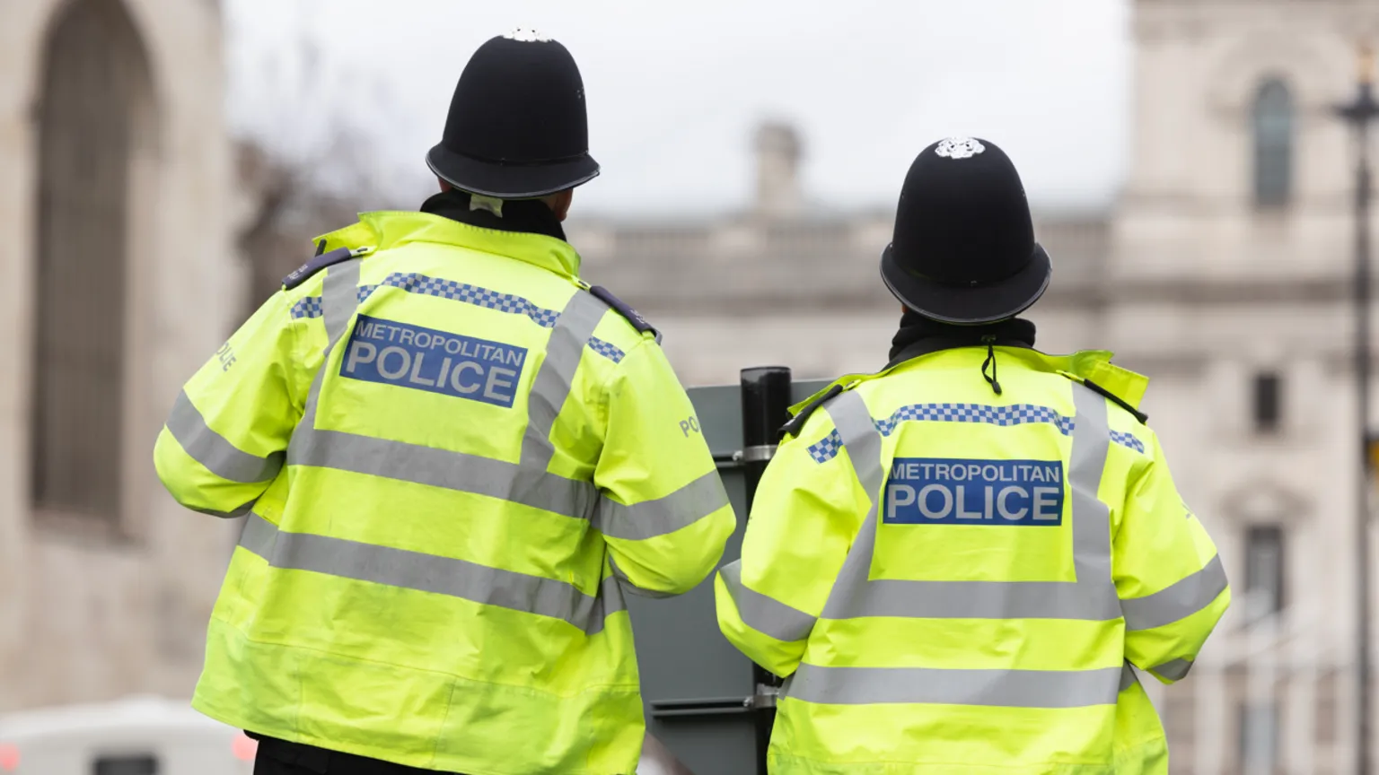  Two police officers pictured in Westminster