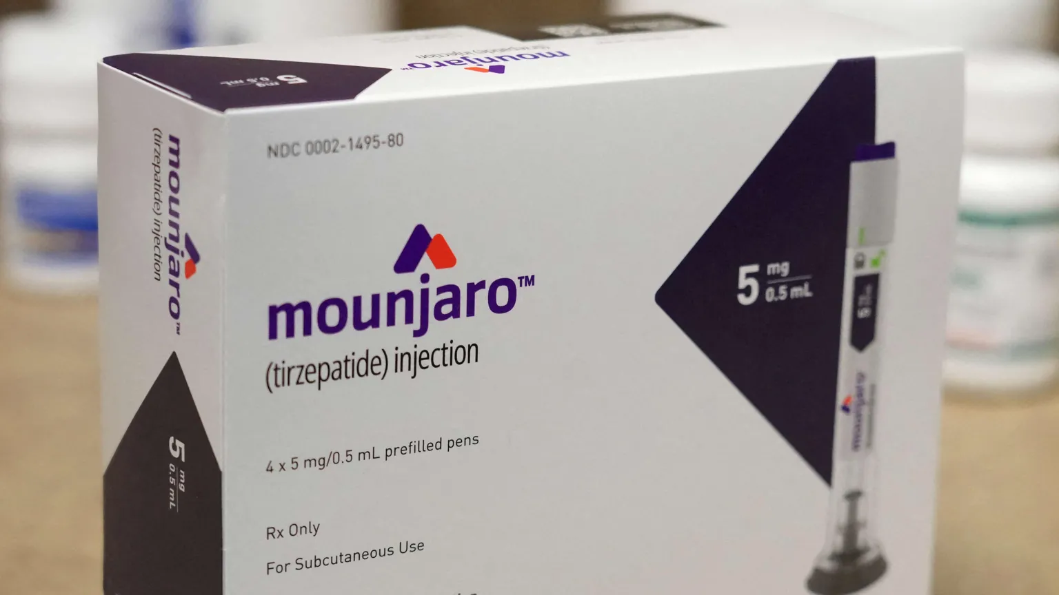 A box of four pre-filled pens containing Mounjaro