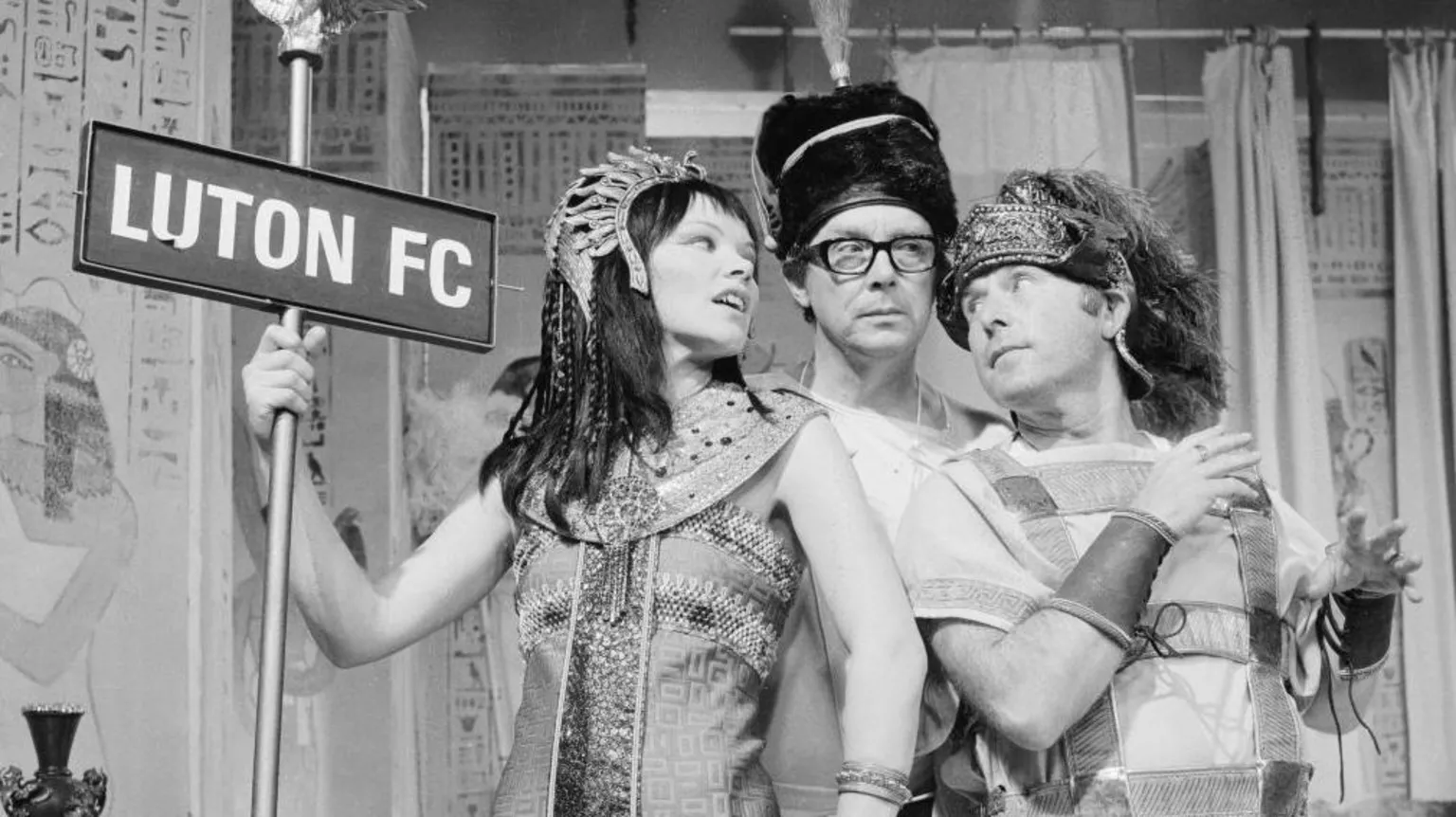 Eric Morecambe and Ernie Wise dressed as ancient Egyptians alongside actress Glenda Jackson