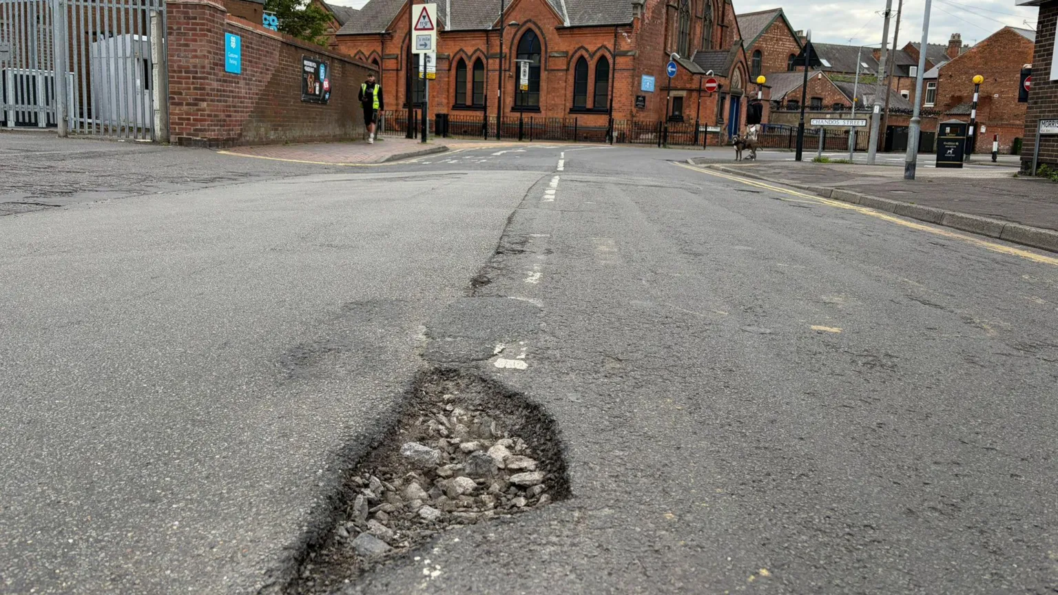 A pothole on a busy side road in Netherfield.