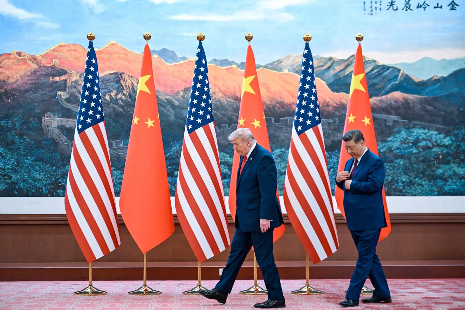 AFP via China's President Xi Jinping (R) receives US President Donald Trump after a welcome ceremony at the Great Hall of the People in Beijing on May 14, 2026.