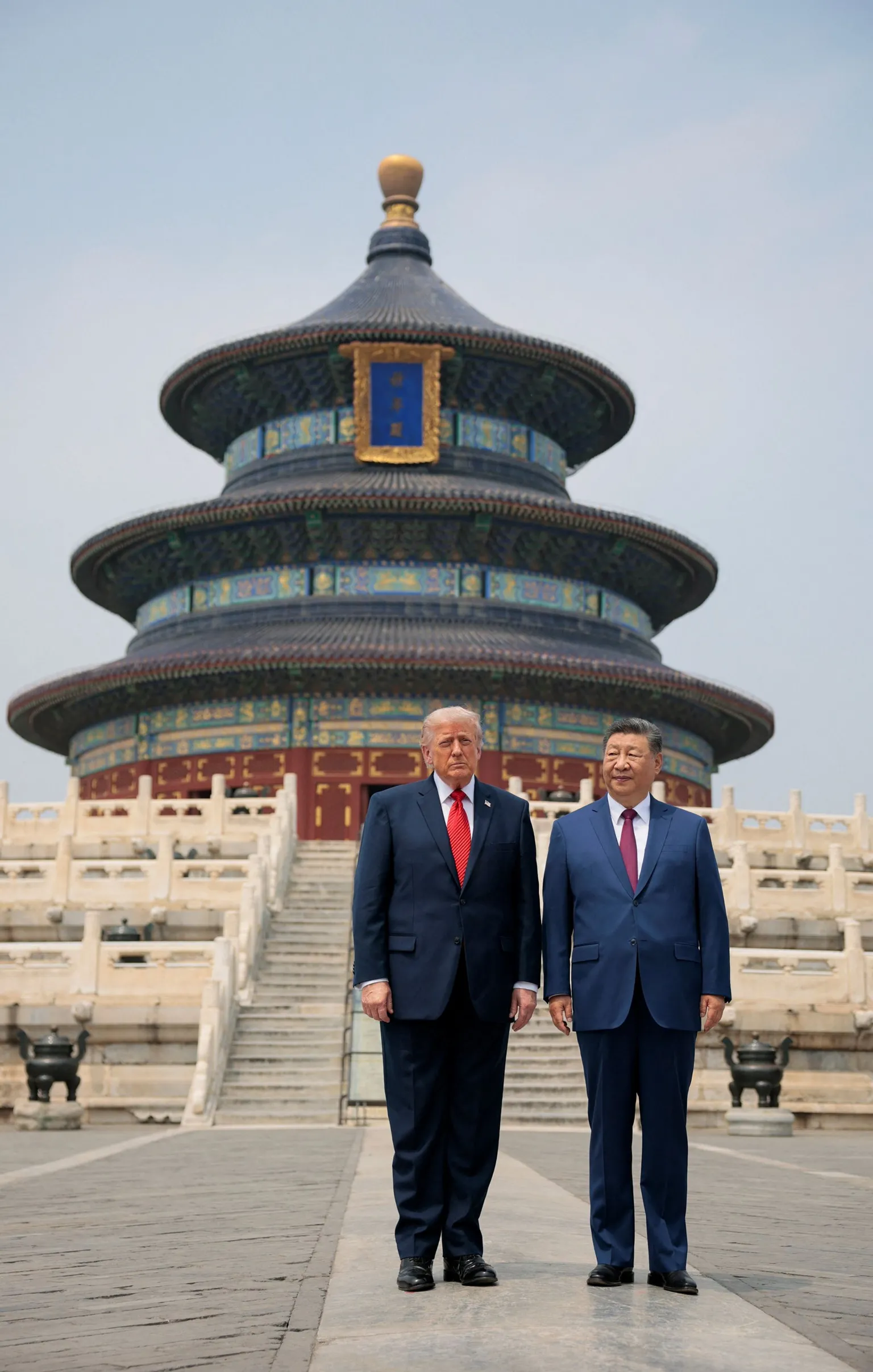 U.S. President Donald Trump and Chinese President Xi Jinping stand together as they tour the Temple of Heaven in Beijing, China, May 14, 2026.