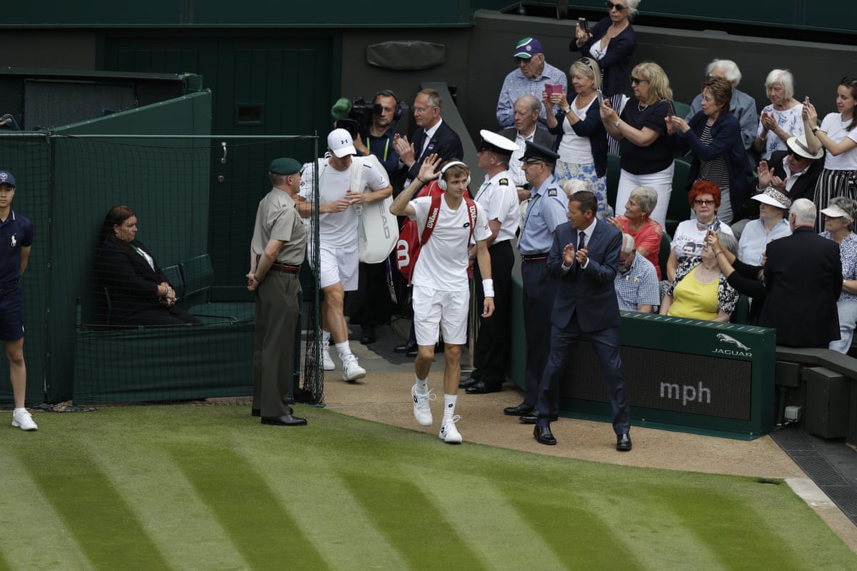 Alexander Bublik walks on to Wimbledon’s Centre Court for his match against Andy Murray in 2017
