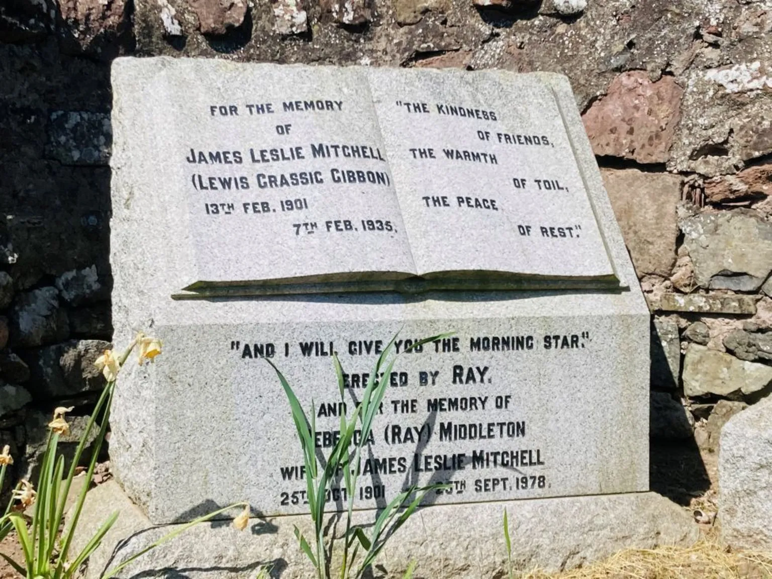 Gravestone which reads: For the memory of James Leslie Mitchell (Lewis Grassic Gibbon), 13th Feb 1901 - 7th Feb 1935.