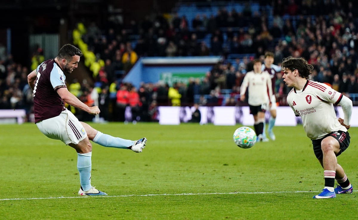 Aston Villa’s John McGinn scores their side’s fourth goal.