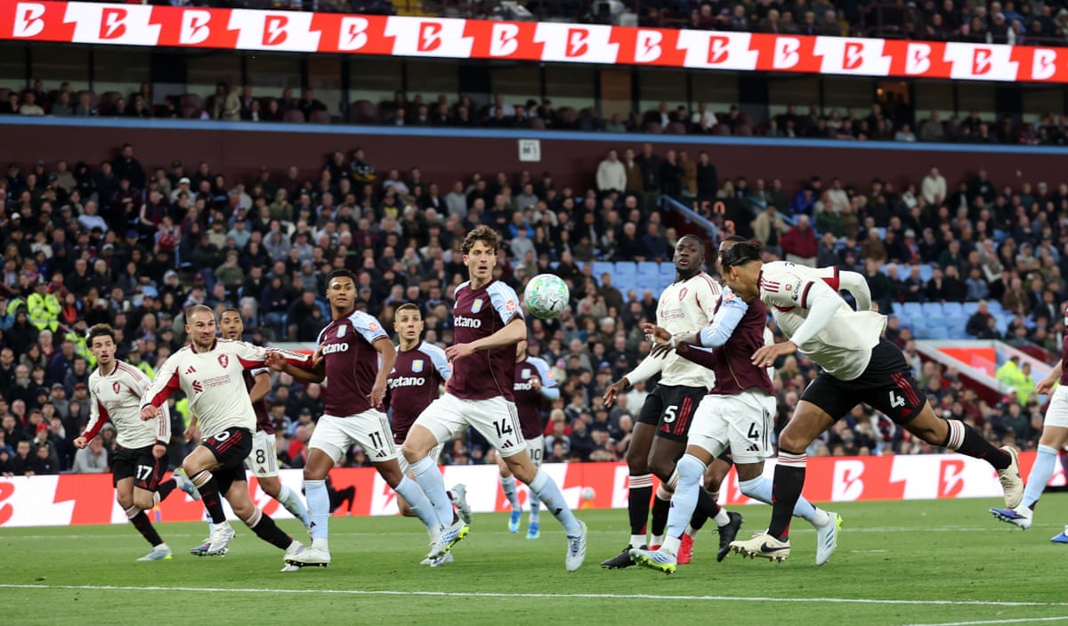 Virgil van Dijk of Liverpool scores a goal to make the score 1-1 at Aston Villa.