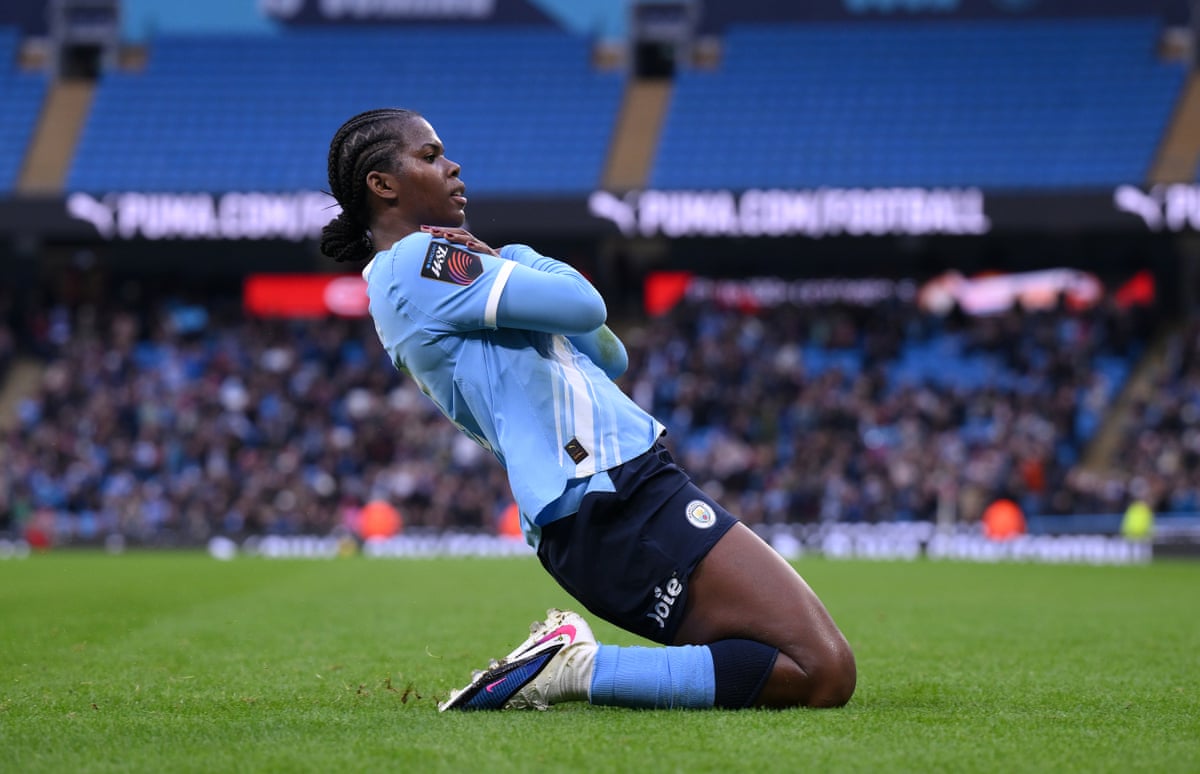 Khadija Shaw celebrates scoring for Manchester City